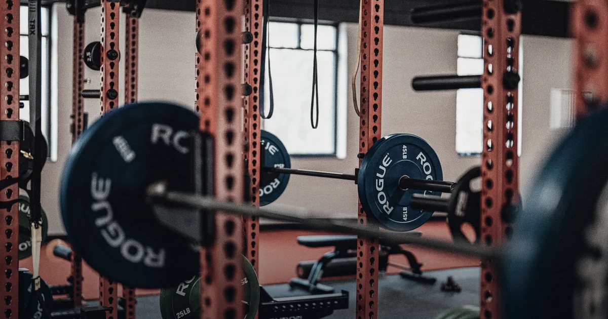 Why runners need a barbell: strength protects economy in the final kilometers